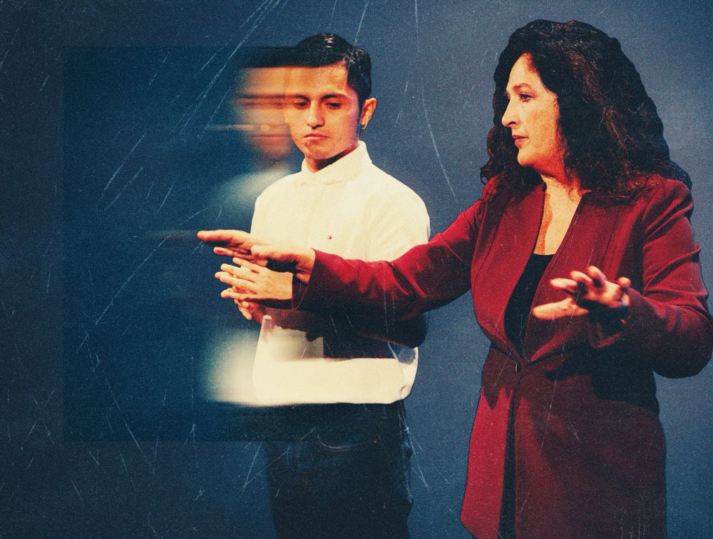 Kathryn Kellner coaching one communicator, mid-gesture